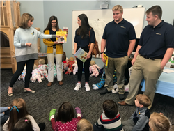 Melissa Workman introduces Giana Loretta, Meg Sorrells, Adam Stilley, and Ryan Maiden as they prepare to read stories to children at the WVU Nursery School.